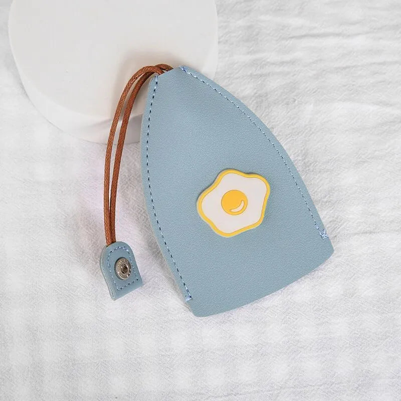 Cartoon design pull-out key case for car keys in PU leather.