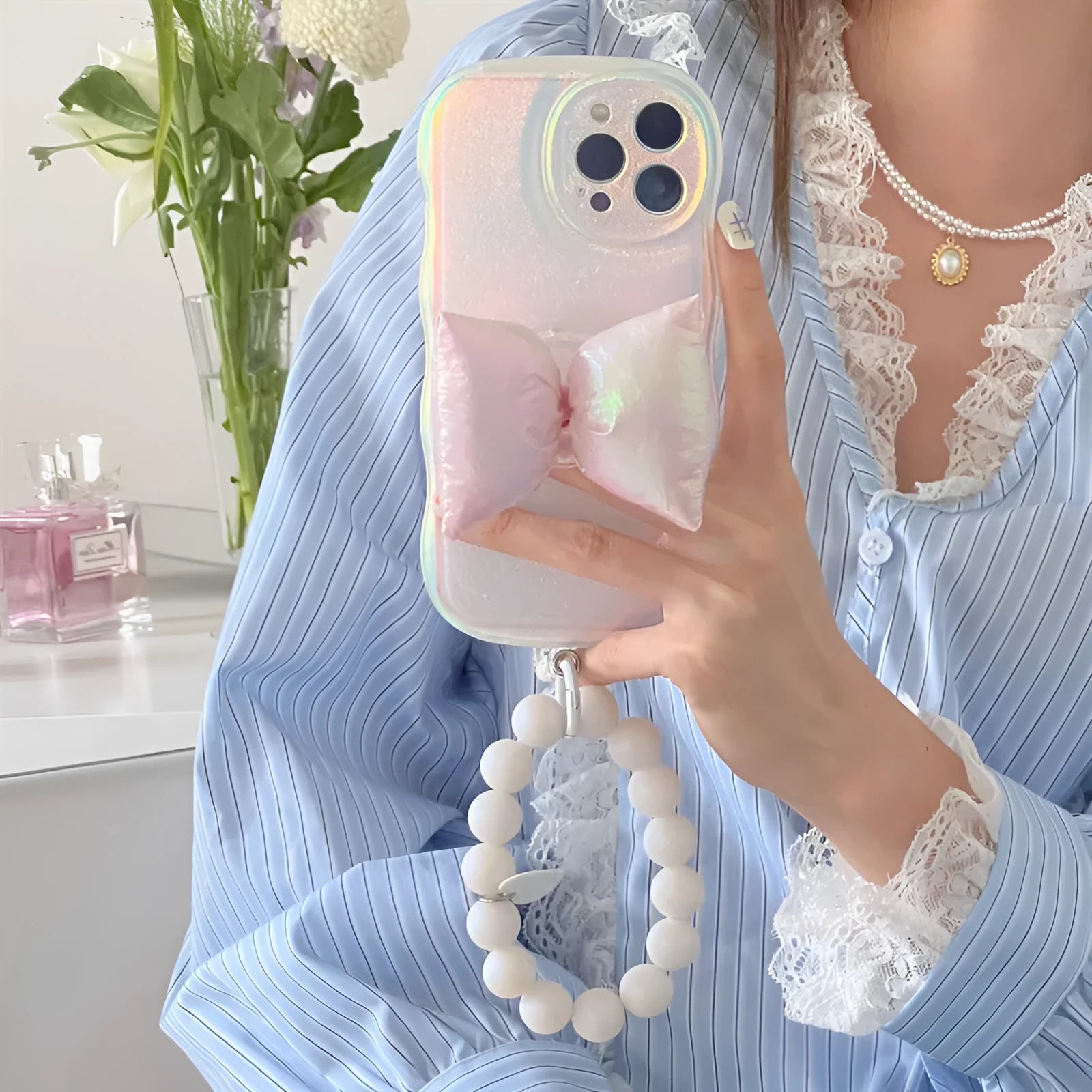 Laser powder bowknot silicone phone case for iPhone with sparkle finish and optional bracelet