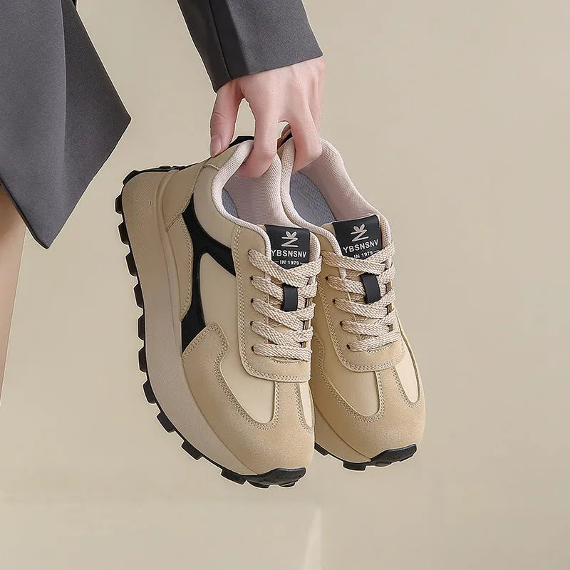 Women's low-top platform sports shoes in card black colour with lace-up front and rubber sole
