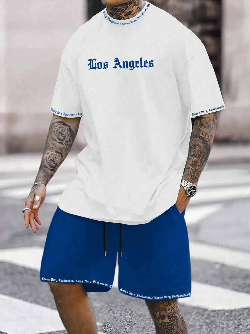 Sports style short-sleeved shirt and matching shorts set in a thin, printed fabric on a mannequin.