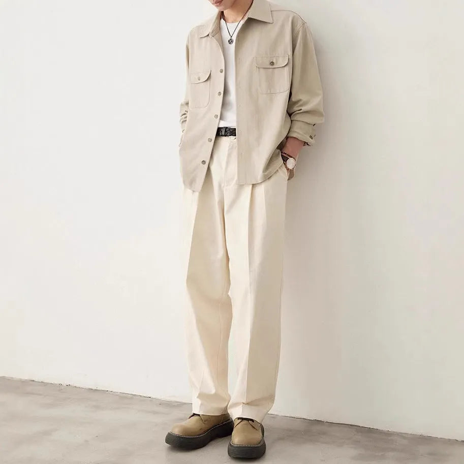 Men's simple profile long sleeve shirt in light sand rice colour with collage stitching detail.