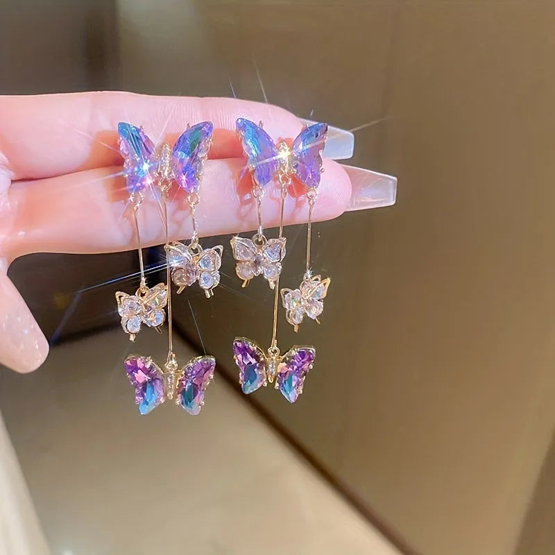 Blue purple butterfly tassel earrings with silver needle crystal flowers, approximately 8 cm drop length