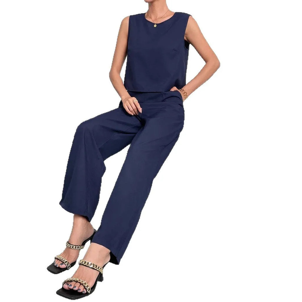 Women's red polyester two-piece set with sleeveless top and wide leg trousers