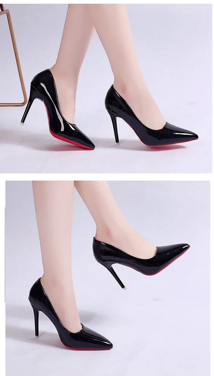 Women's black stiletto heel pumps with pointed toe and shallow mouth design on white background