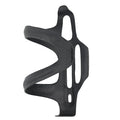 Black carbon fibre bicycle water bottle cage showing mounting holes and bottle retention shape.