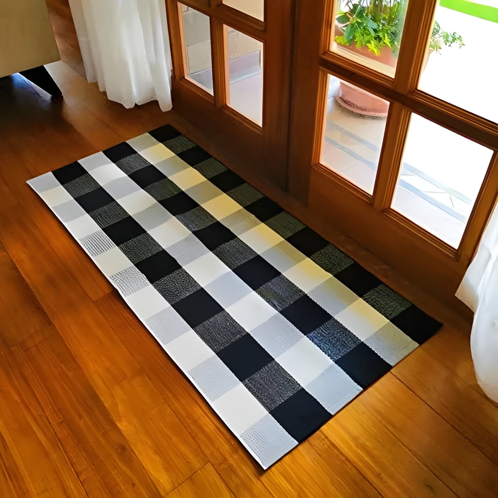 Cotton buffalo plaid rug in classic pattern on a light floor, showing non-slip backing
