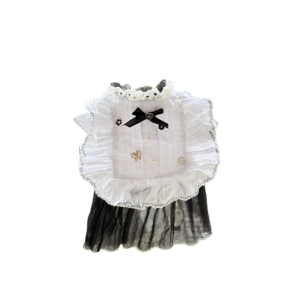 White yarn princess-style Waltz gauze skirt costume on a small dog, showing tiered design.