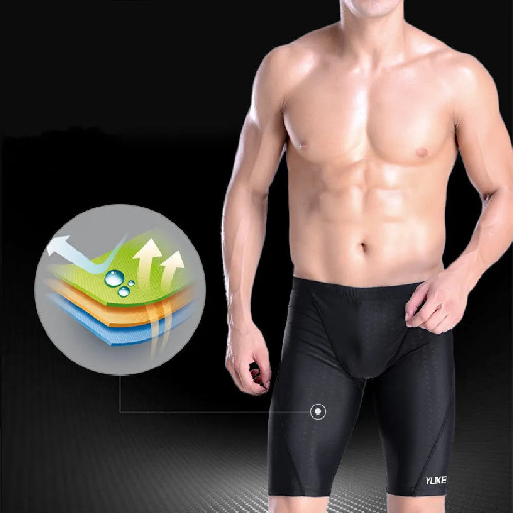 Men's black five-piece swimming set showing trunks, goggles, cap, ear plugs, nose clip, and storage bag
