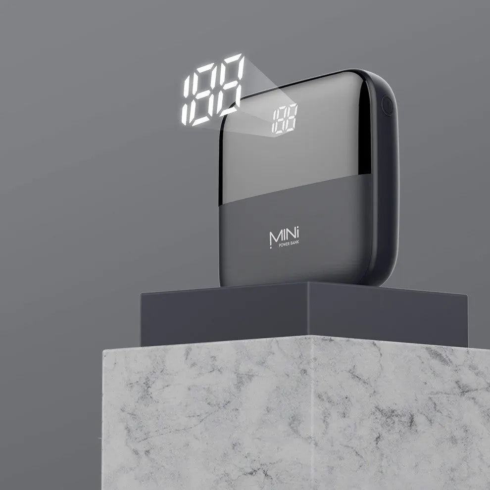 Android portable power bank with digital display showing battery level