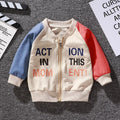 Children's Korean baseball jacket in beige with animal print, V-neck, long sleeves, non-hooded, on child.