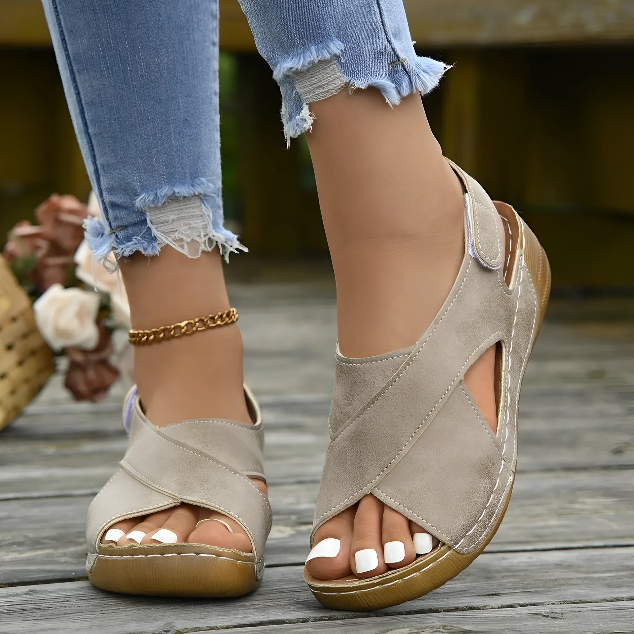 Women's brown Roman platform sandals with a skirt detail and Velcro strap.