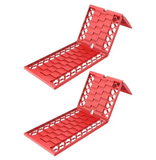 Orange folding rescue boards for vehicle recovery in mud and snow conditions