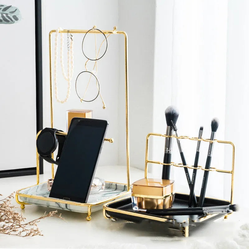 Modern cosmetics storage rack in army green iron art and ceramic on desktop with makeup brushes