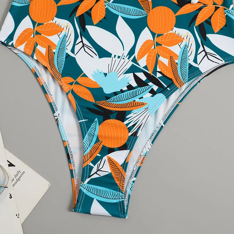 Women's high waist one-piece swimsuit in printed black or white pattern with conservative styling