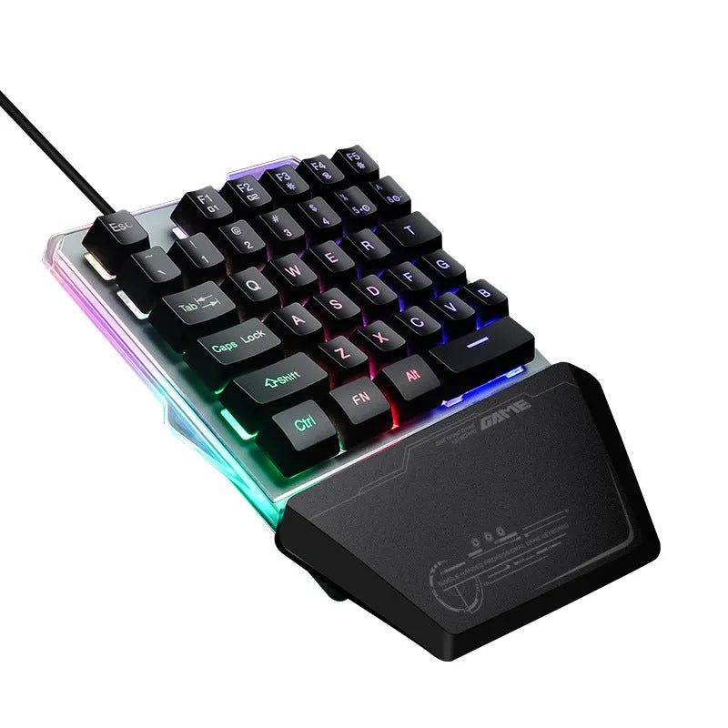 G40 Flow Colour black one-handed robotic keyboard with RGB backlit keys on a desk