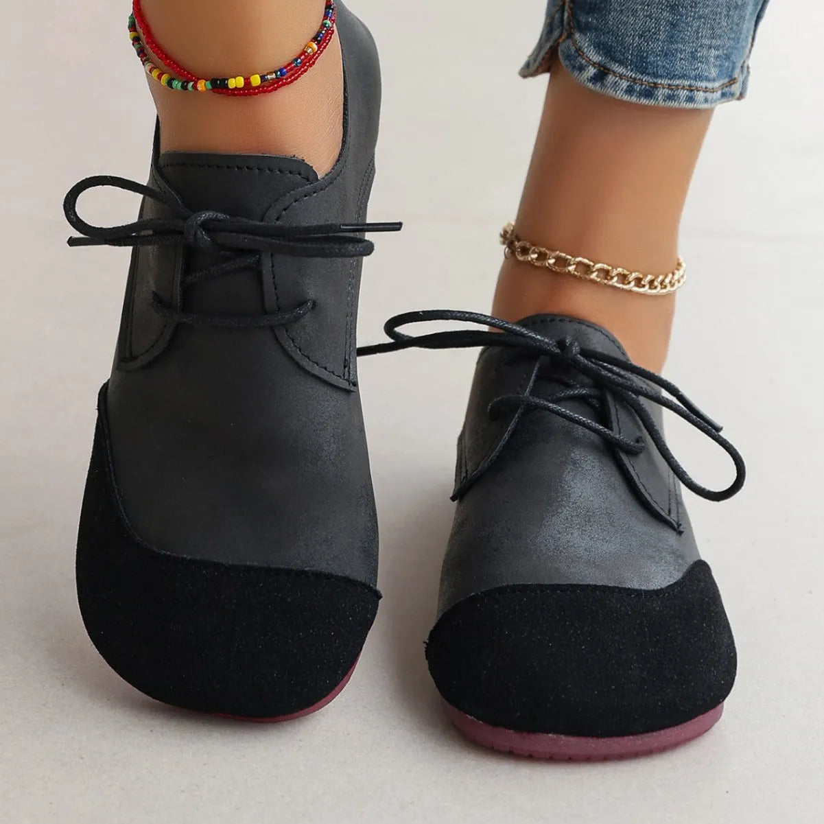 Flat retro soft leather western style slip-on loafers in black, round toe, low heel, belt decoration