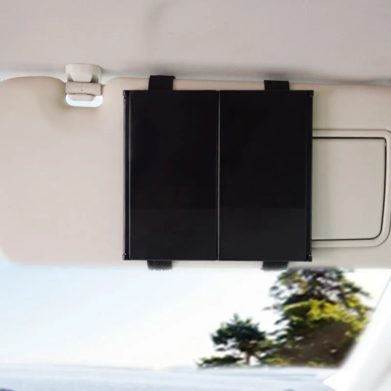 Silver folding car visor makeup mirror shown open and closed on a car sun visor