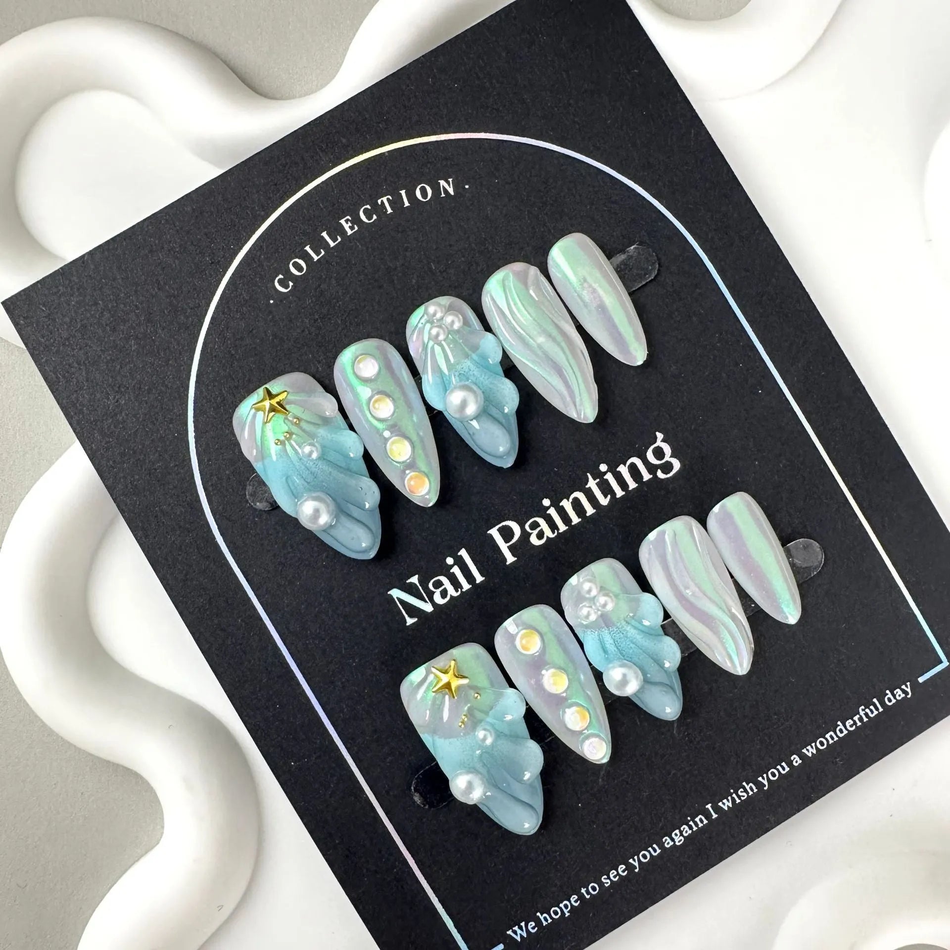 Blue plastic shell nail stickers set with four size options XS S M L