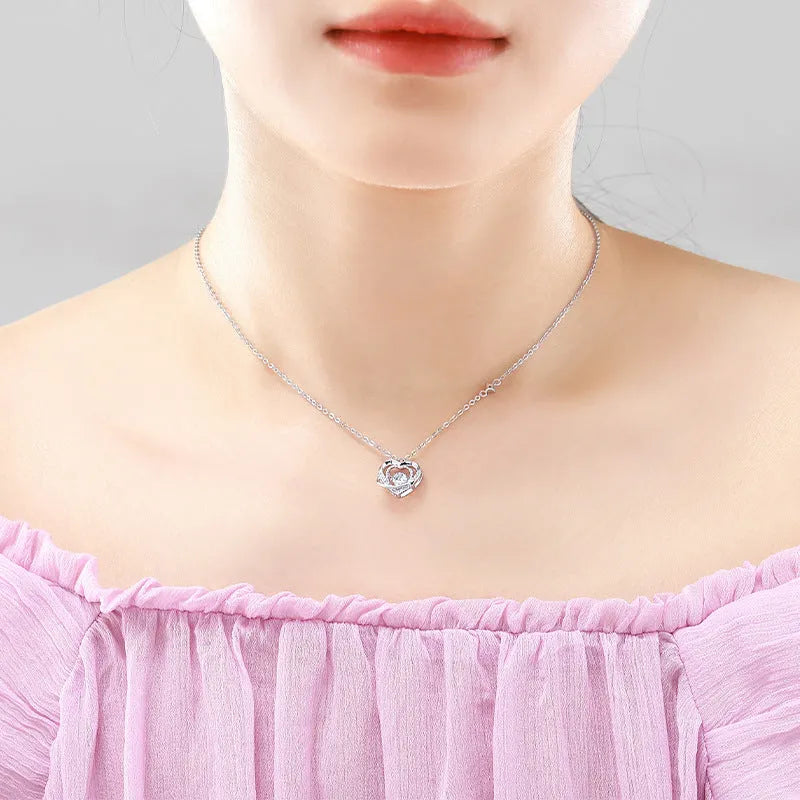 925 sterling silver heart pendant necklace with O-shaped chain and Seiko finish on white background