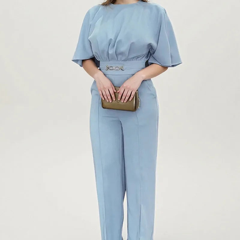 Blue men's two-piece polyester suit with jacket and trousers on a hanger