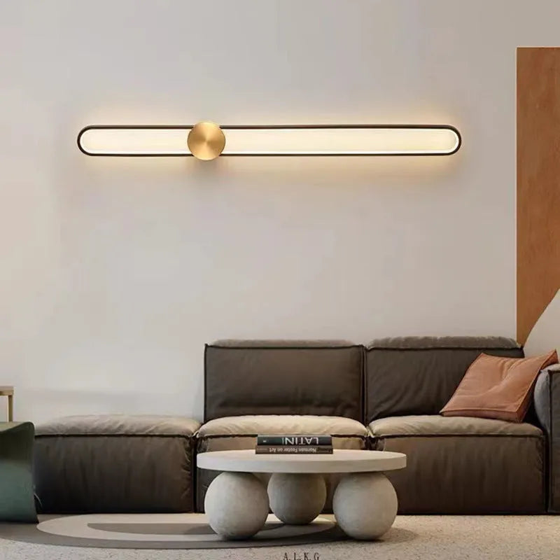 Modern round wall lamp with iron shade in choice of four finishes including black and gold options