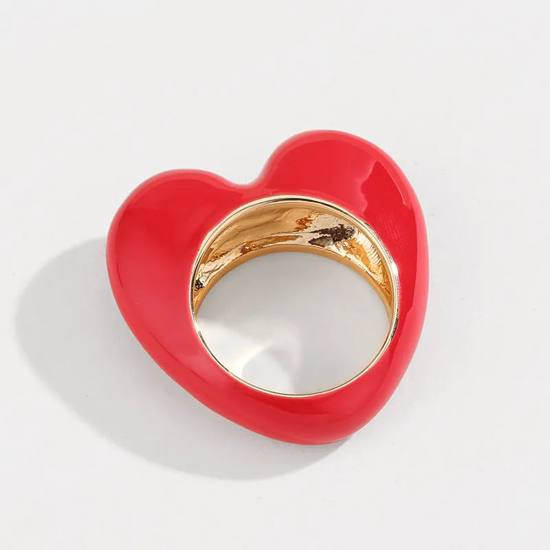 Zinc alloy heart-shaped ring with raised three-dimensional enamel colour detailing in love motif design