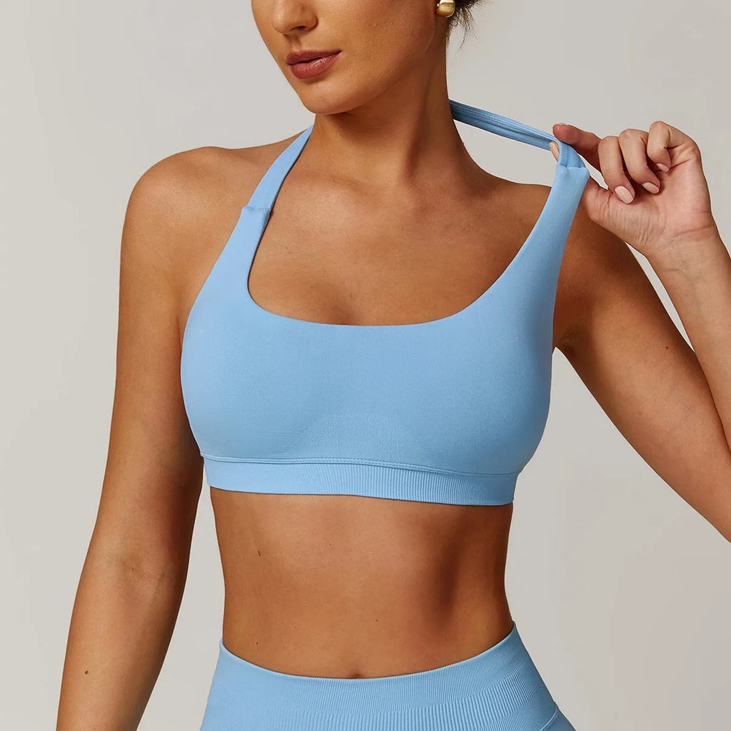 Women's halter neck yoga sports bra with medium support in five colour options