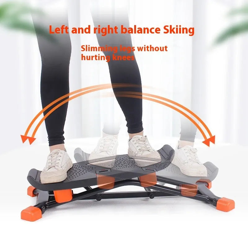 Black portable mini fitness skiing machine with elastic hand straps for indoor home workouts