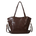 New retro commuter tote bag in soft PU, black colour, bucket shape with visible stitching and double shoulder straps