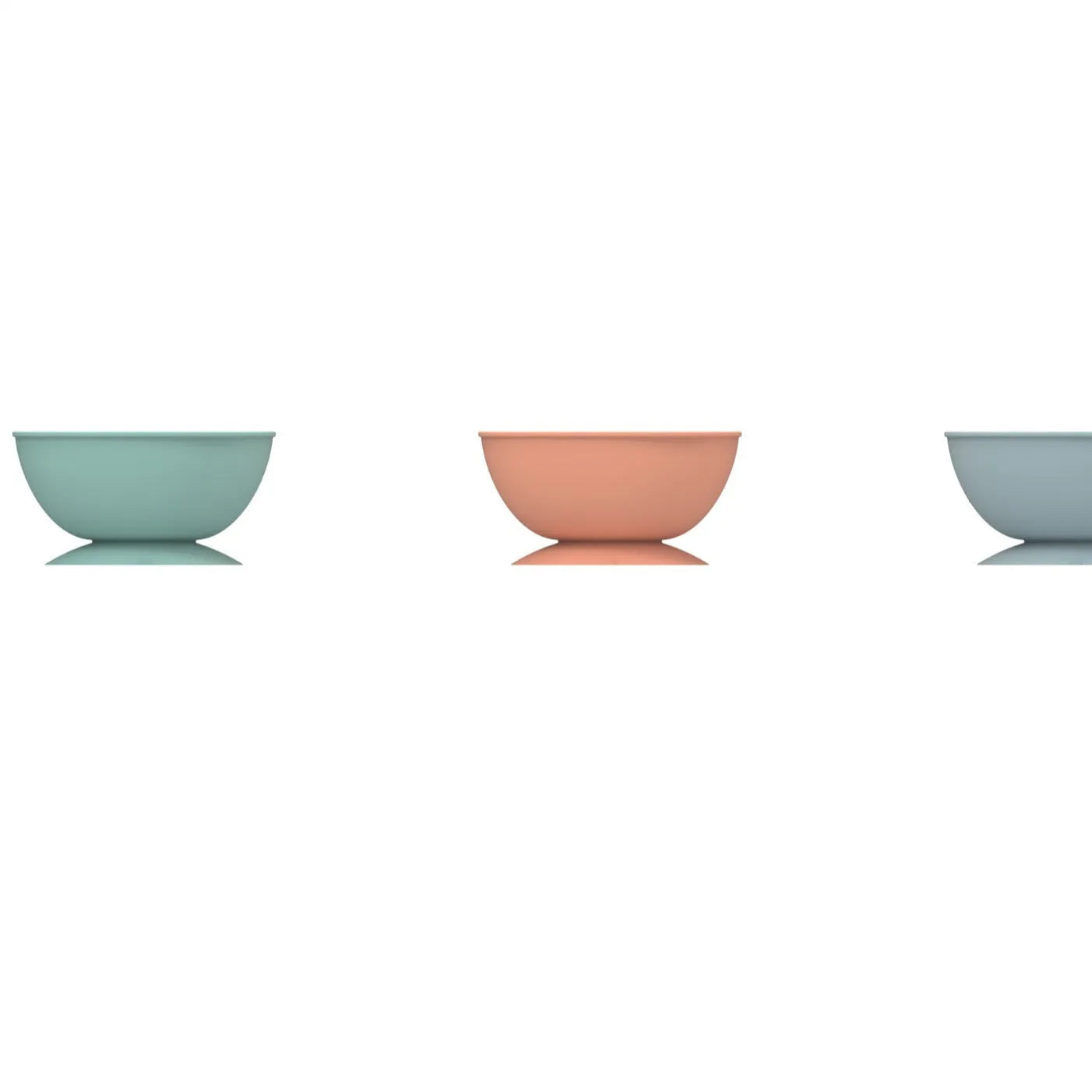 Cyan silicone dog bowl with raised licking mat texture and suction cup base on a floor.