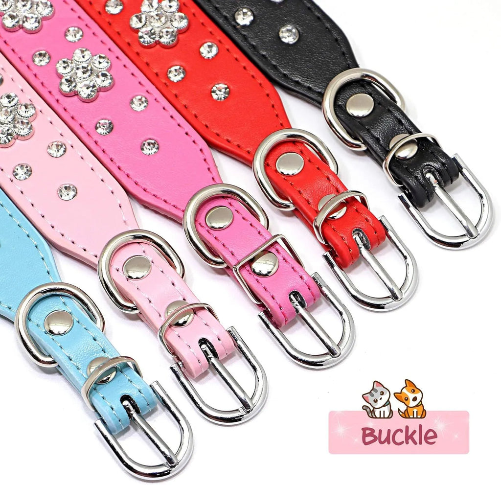 Close-up of a black PU leather dog collar with a sparkling rhinestone flower pattern and silver studs.