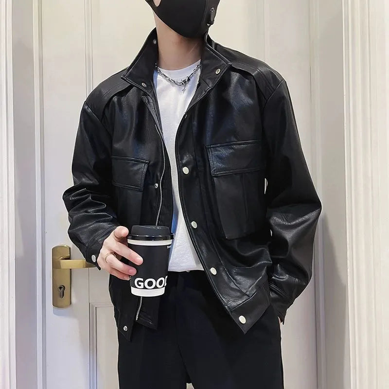 Men's black Korean-style PU leather jacket with straight hem and side pockets.