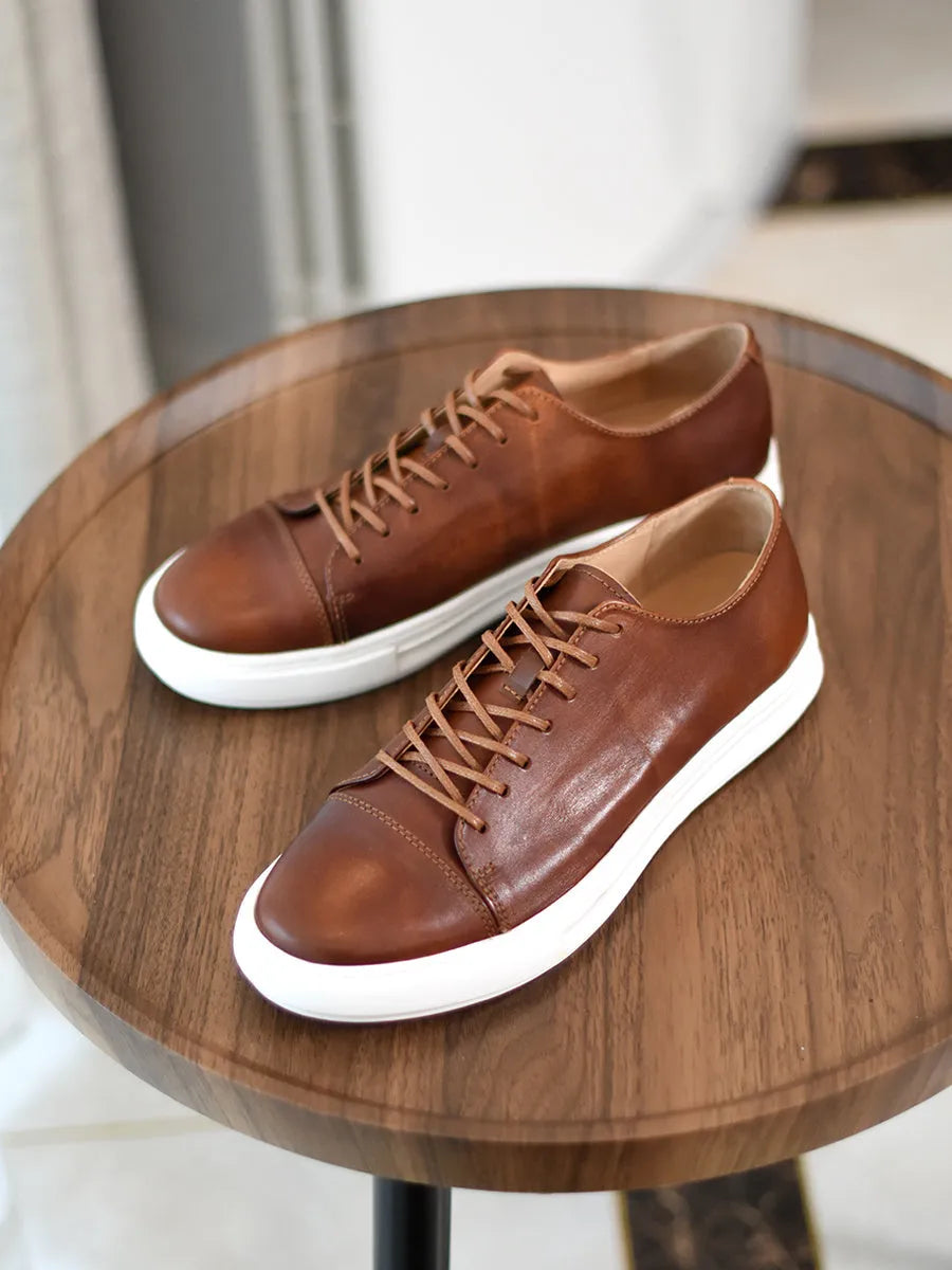 Men's handmade first-grain horse leather distressed casual shoes in dark brown with lace-up closure and stitching