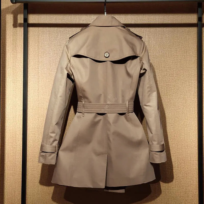Khaki women's trench coat with double-breasted button front and structured flight sleeves