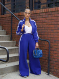 Grey striped sweater and matching pants two-piece set in street hipster style