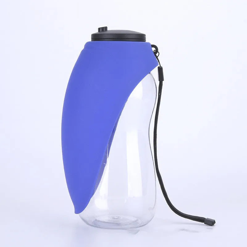 Blue plastic dog water bottle with drinking bowl showing key lock mechanism and 680ml capacity markings