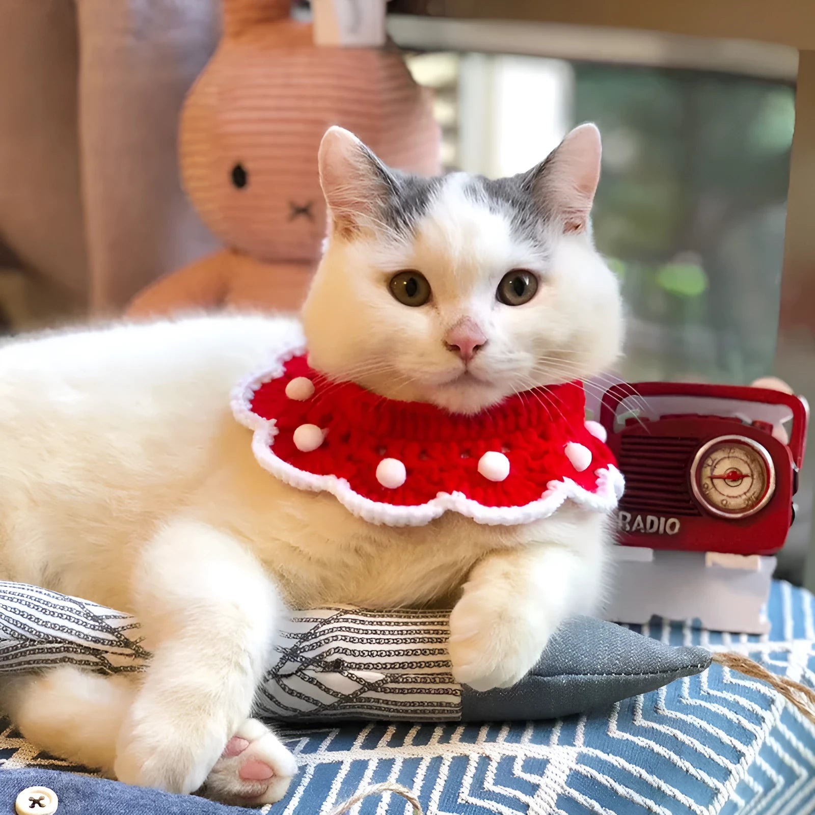 A cartoon-patterned wool knitted pet collar for small dogs, cats, or rabbits in milk cotton.