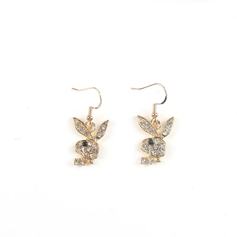 Close-up of cute full diamond rabbit stud earrings in alloy, showing gold, pink, and silver colour options.