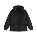 Loose-fitting solid-colour winter cotton-padded jacket with side pockets, shown on a hanger.