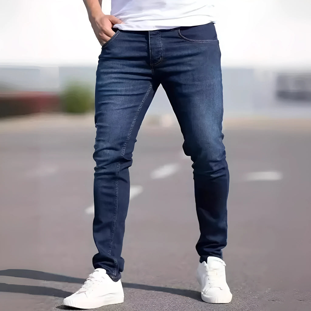 Men's dark blue slim street fashion jeans with mid waist and zipper fly