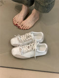 Girlish style bow white sneaker for women, low-top round toe, black colour option, side view