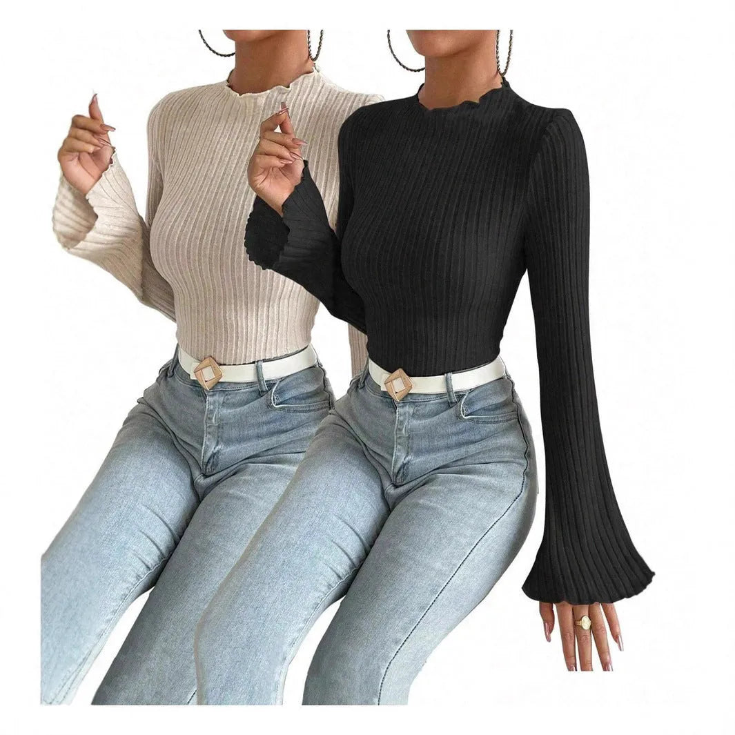 Long sleeve slim fit top with lantern sleeves and sunken stripe pattern in polyester fabric