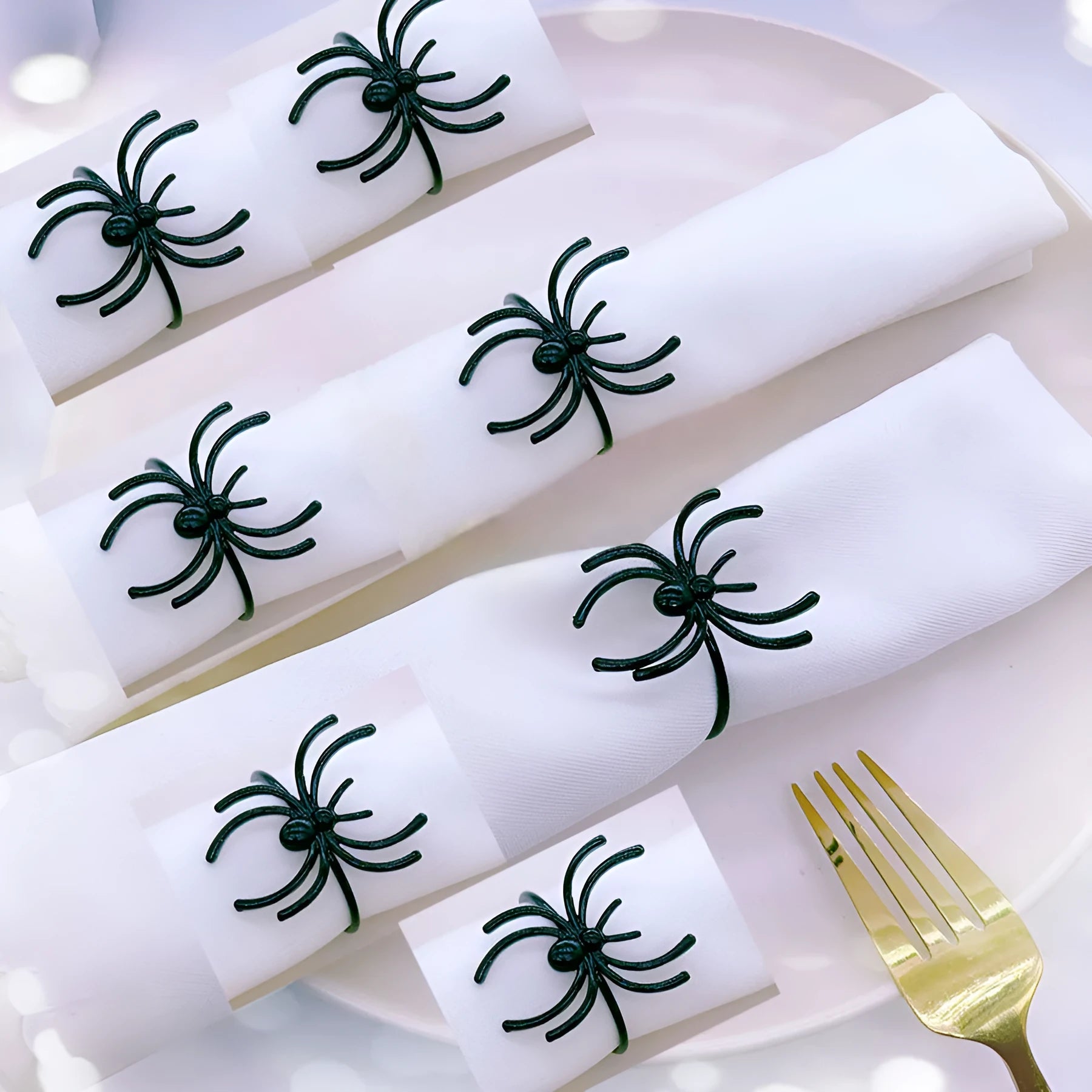 Six black spider-shaped alloy metal napkin rings for Halloween table decoration