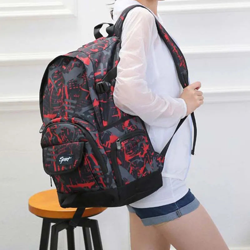 Classic blue nylon backpack with large main compartment, shown front view.