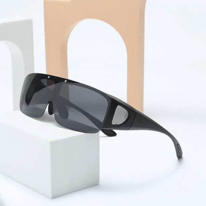 Polarised one-piece sunglasses for myopia with multiple lens options including black, grey, dark green, and night vision.