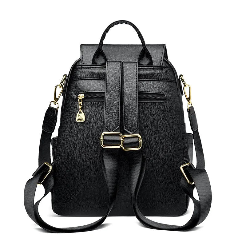 Genuine leather women's student travel backpack with pendant in beige colour, featuring covered outer pocket and belt decoration