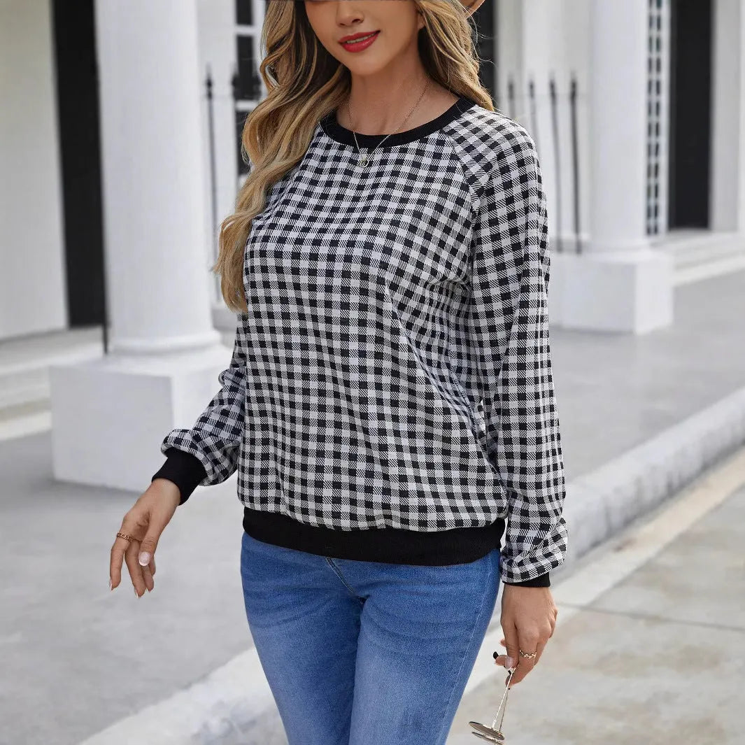 Black plaid striped long sleeve pullover sweater with printed design elements