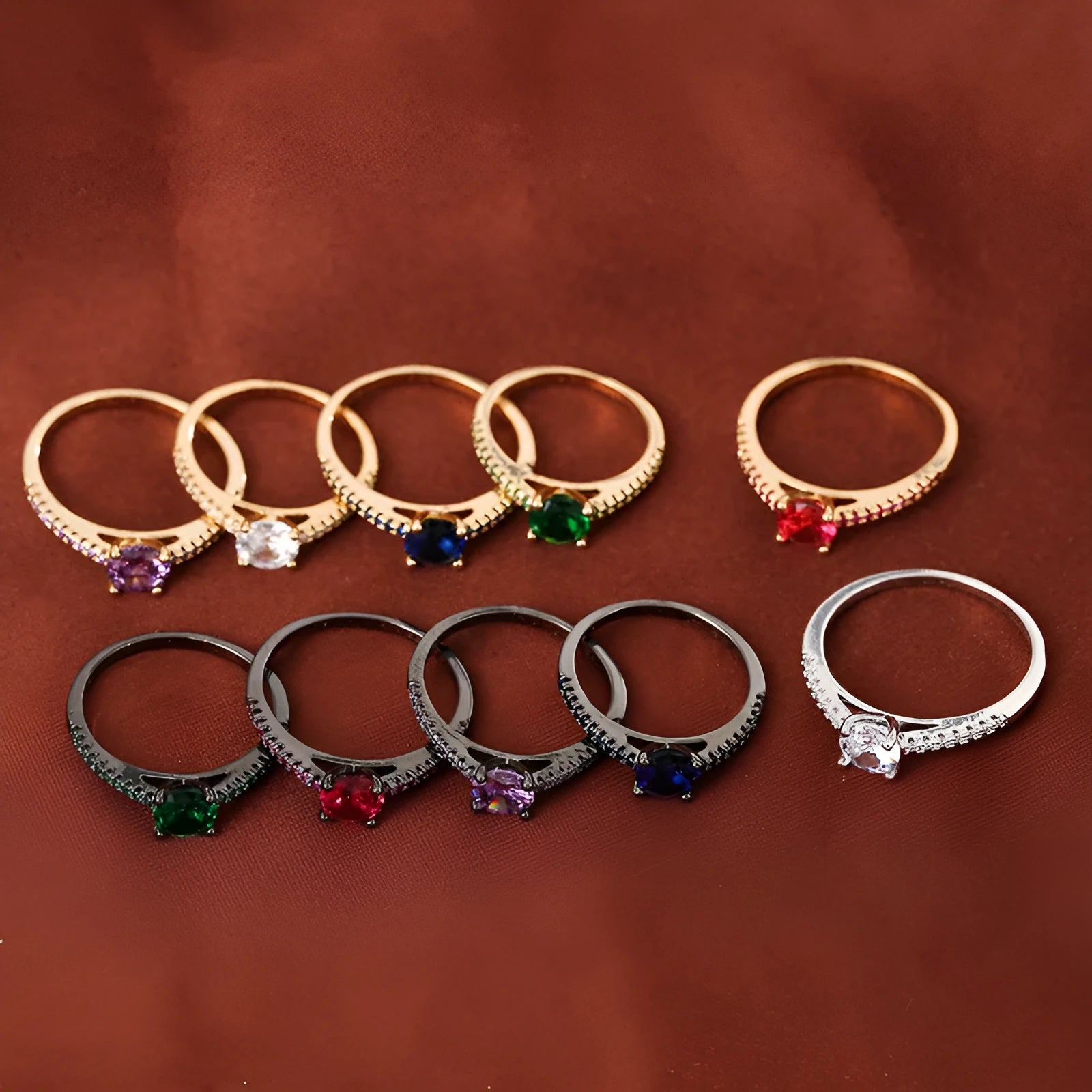 Geometric hexagon zircon ring on copper band in a gold and rose red electroplated finish.