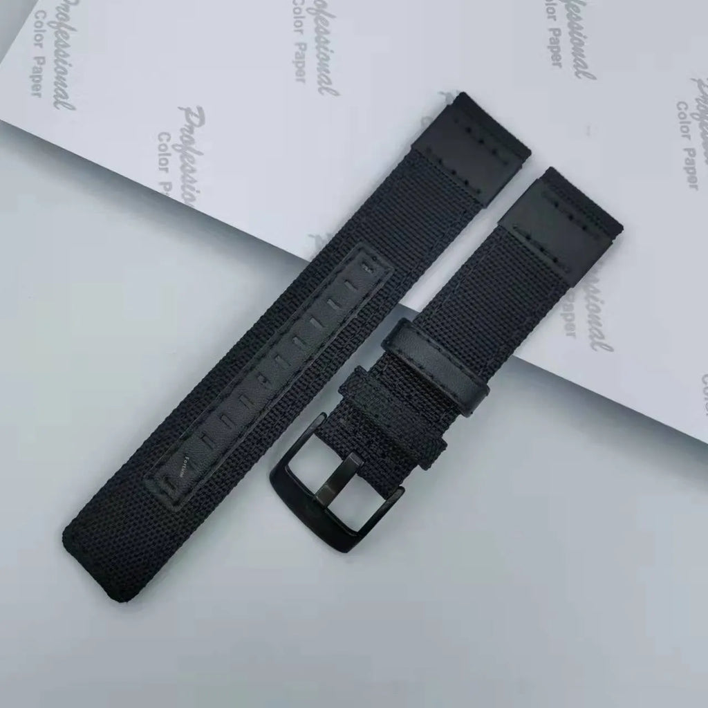 Oxford cloth watch strap in army green showing textured fabric and standard watch lug attachment
