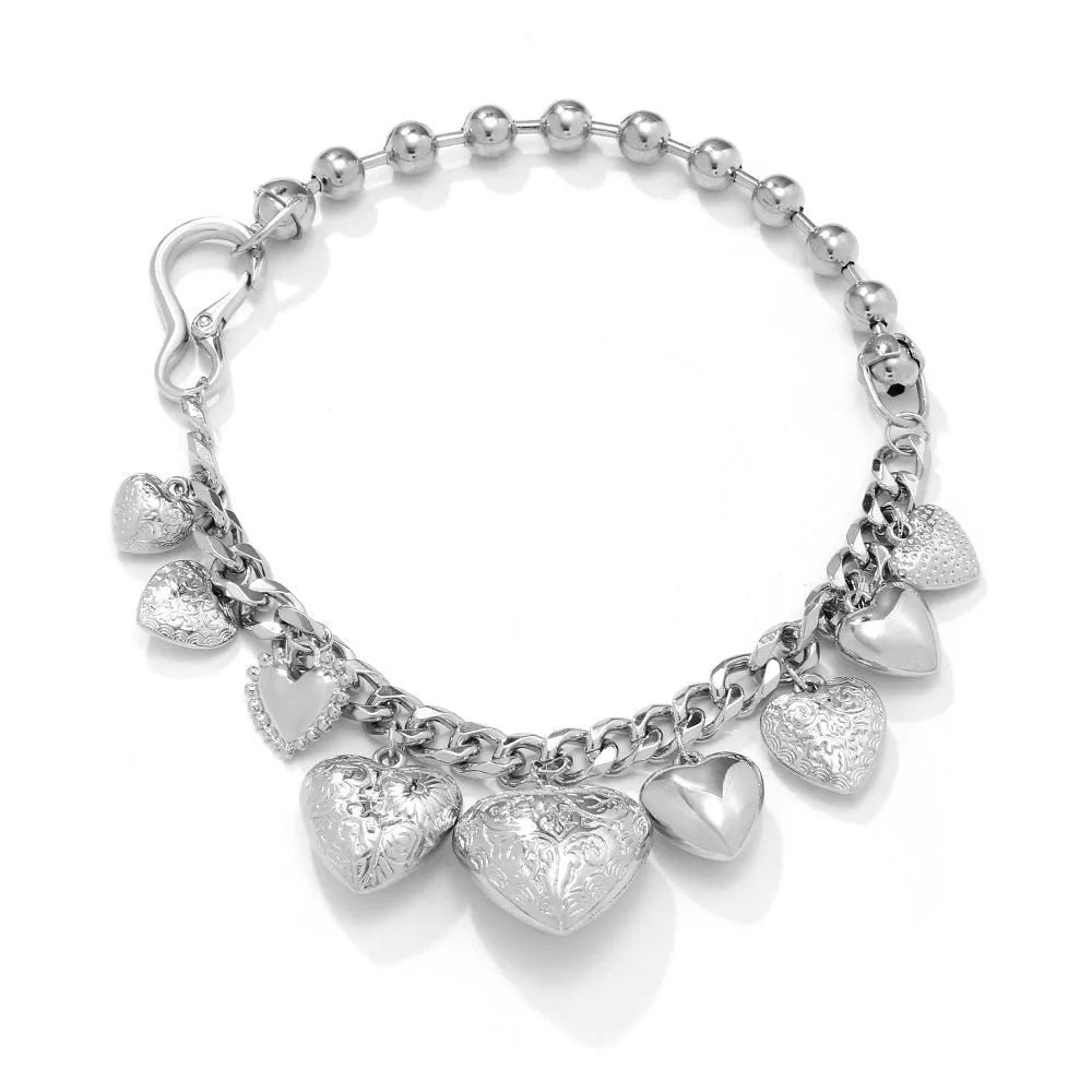 Carved heart pendant necklace in gold or white K with textured surface and exaggerated size